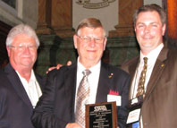 Recipient Ron Underwood with Chuck Wuttke (L) and John Underwood (R)
